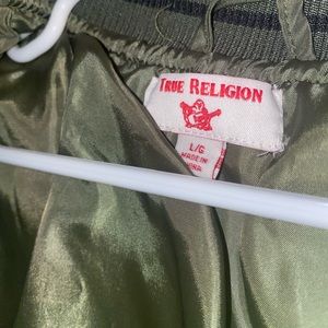 Puffy army green and black letter True Religion jacket